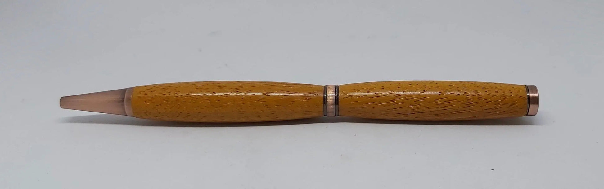 Ballpoint pen handmade in Iroko wood from Phoenix Wharf, Plymouth. DevonPens