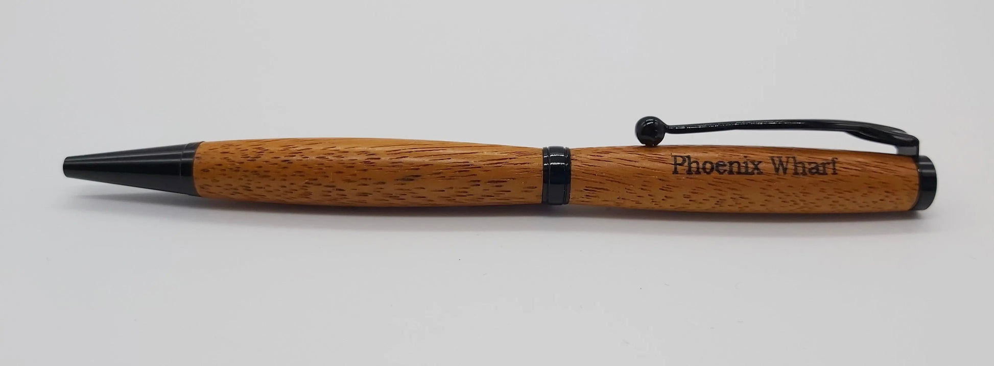 Ballpoint pen handmade in Iroko wood from Phoenix Wharf, Plymouth. DevonPens