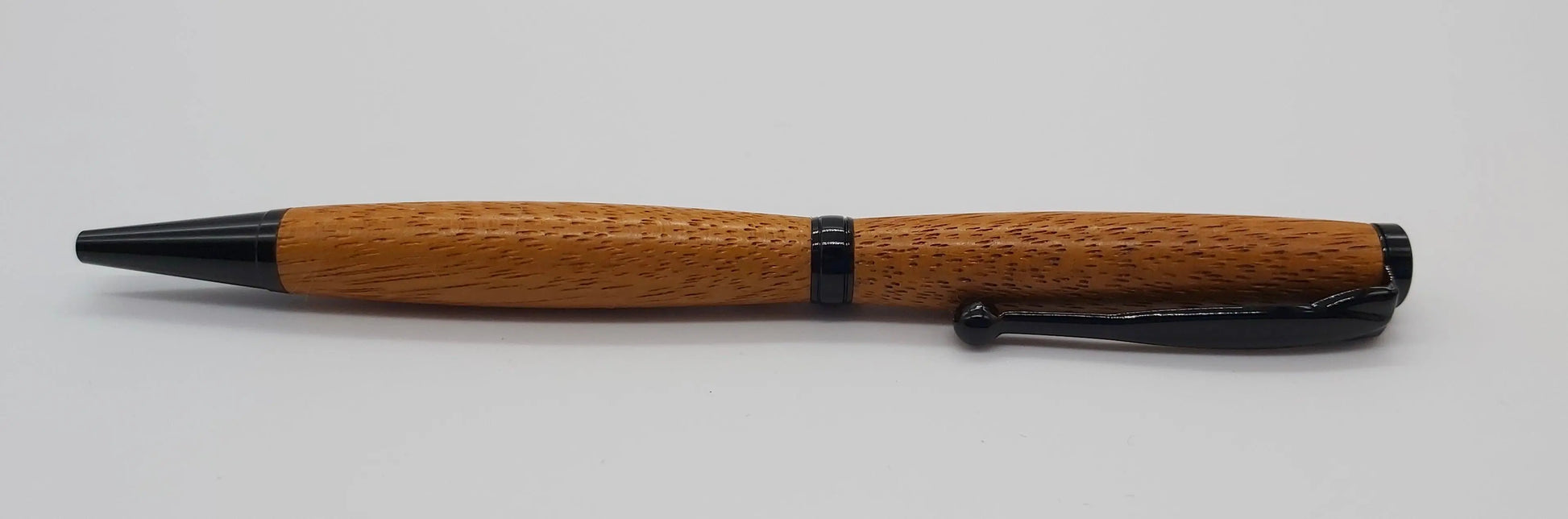 Ballpoint pen handmade in Iroko wood from Phoenix Wharf, Plymouth. DevonPens