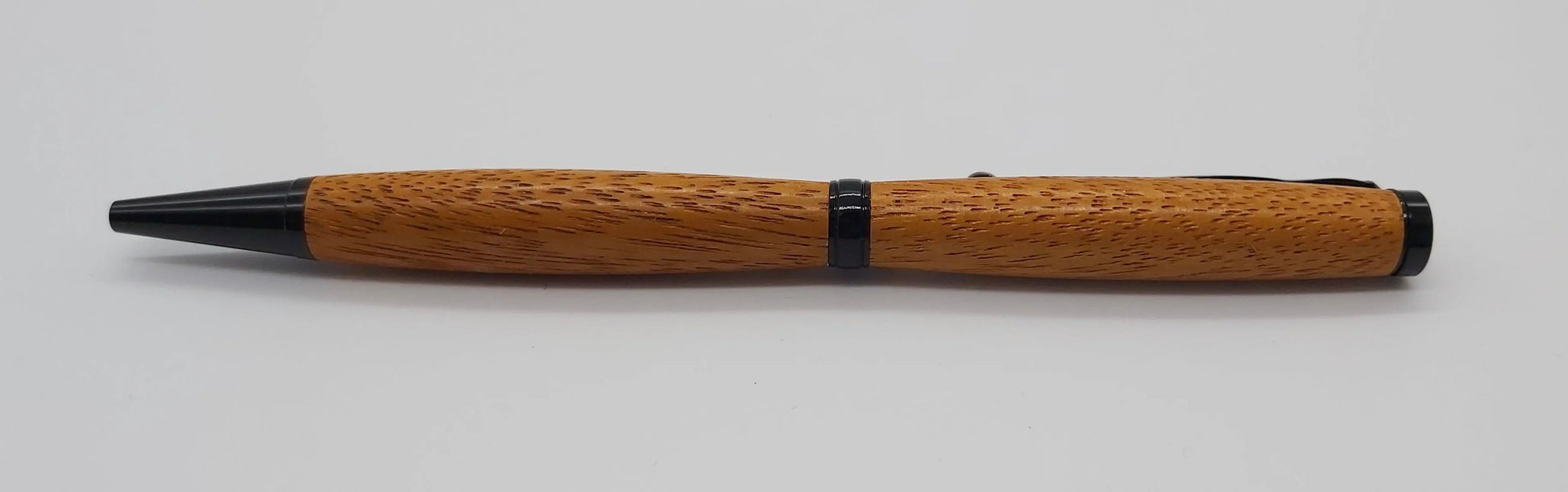 Ballpoint pen handmade in Iroko wood from Phoenix Wharf, Plymouth. DevonPens