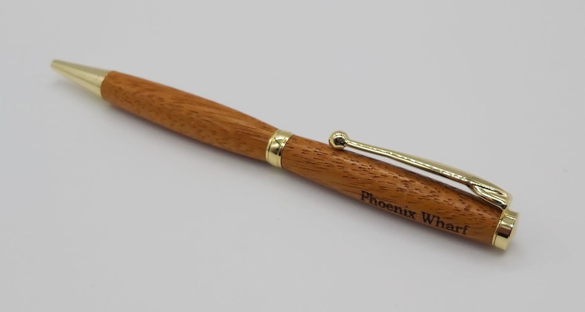 Ballpoint pen handmade in Iroko wood from Phoenix Wharf, Plymouth. DevonPens