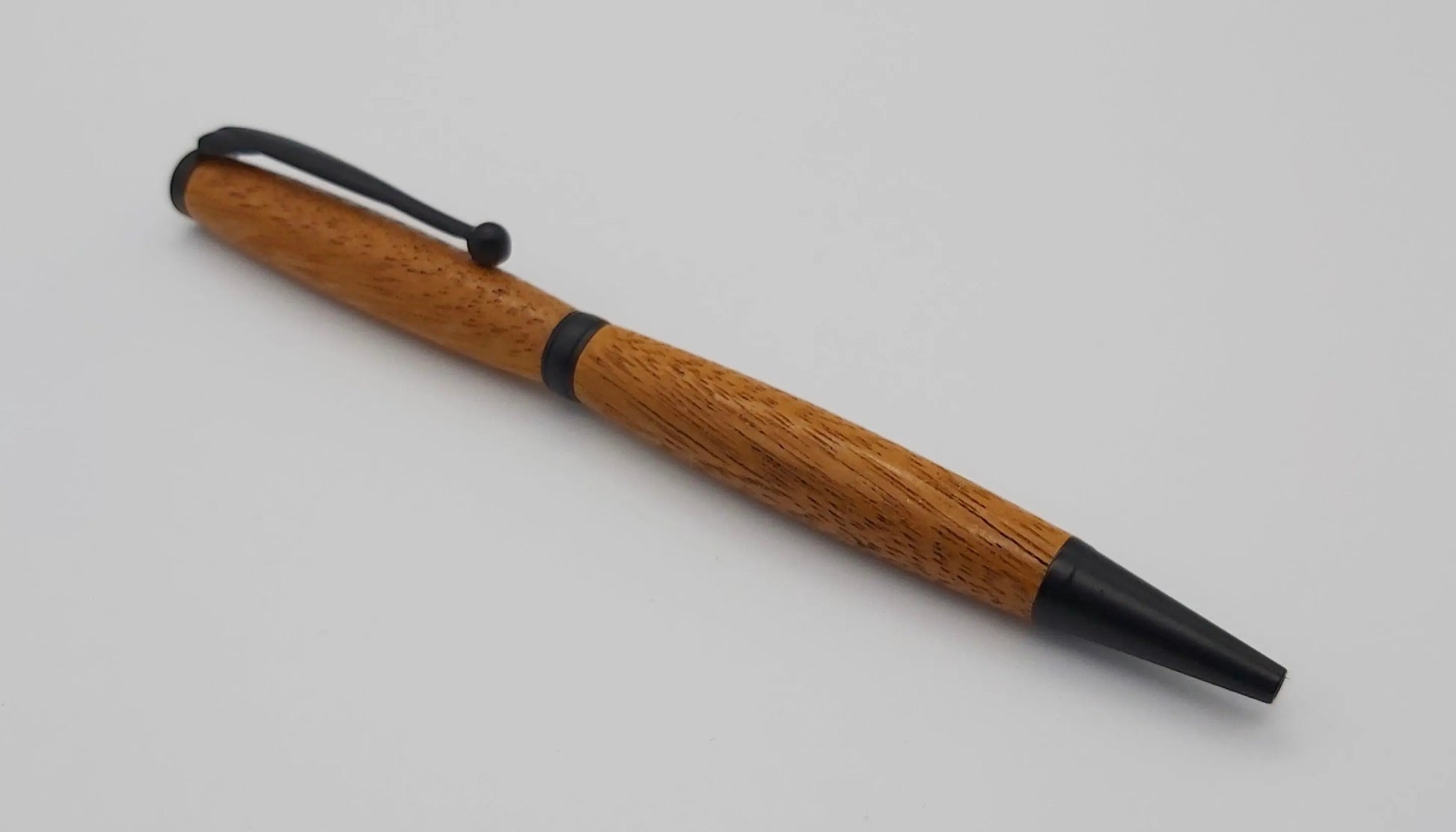 Ballpoint pen handmade in Iroko wood from Phoenix Wharf, Plymouth. DevonPens