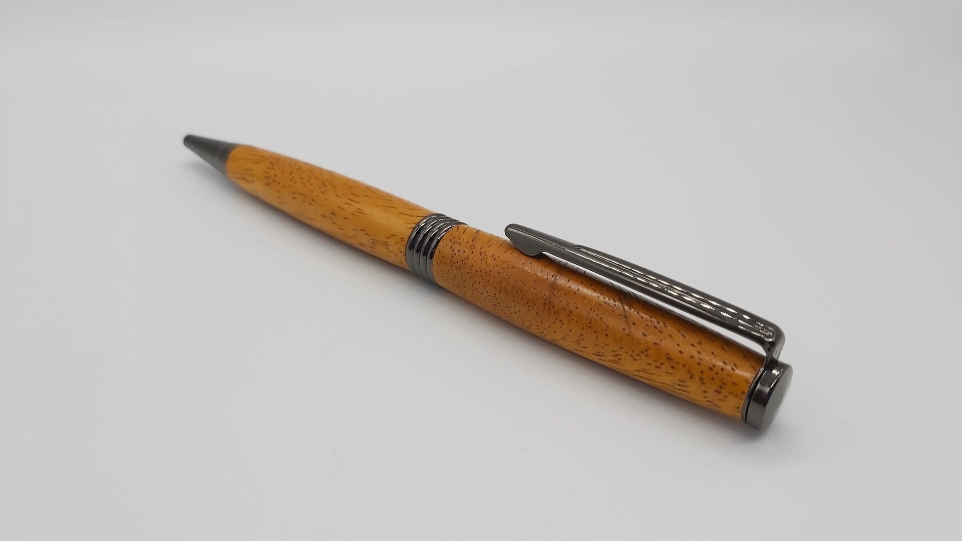 Ballpoint pen handmade in Iroko wood from Phoenix Wharf, Plymouth. DevonPens