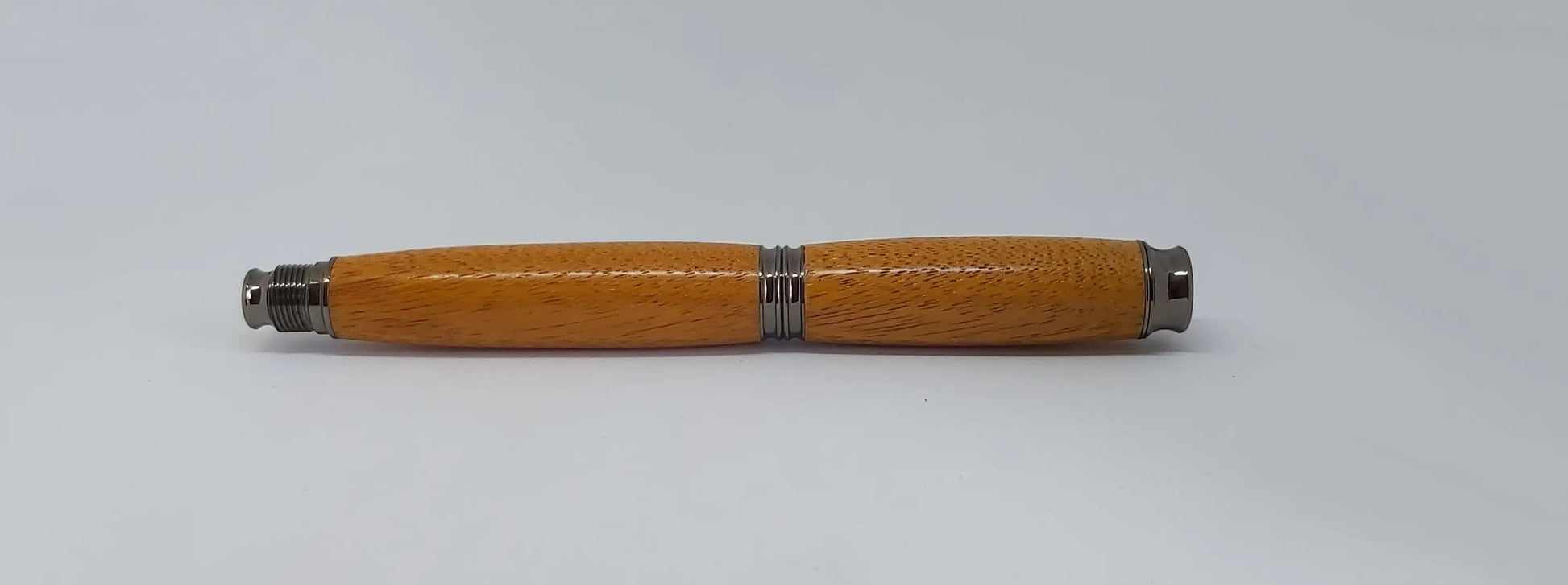 Fountain pen handmade in Iroko wood from Phoenix Wharf, Plymouth. DevonPens