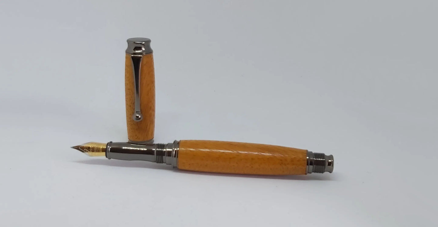 Fountain pen handmade in Iroko wood from Phoenix Wharf, Plymouth. DevonPens