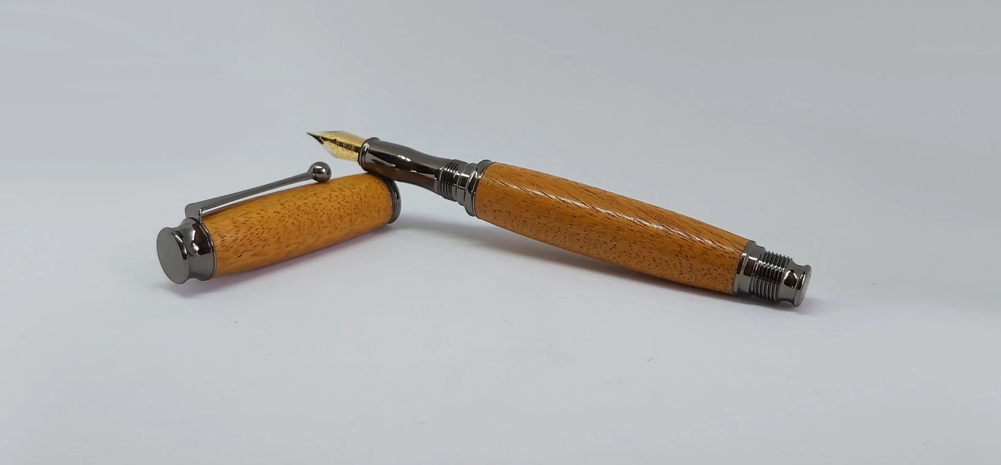 Fountain pen handmade in Iroko wood from Phoenix Wharf, Plymouth. DevonPens