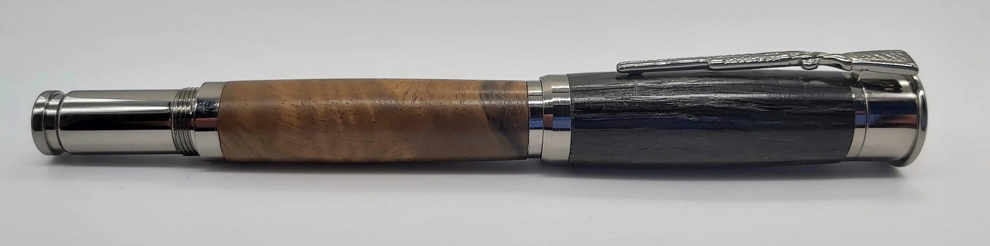 Over and under Rollerball pen with English bog oak and Turkish Walnut. DevonPens