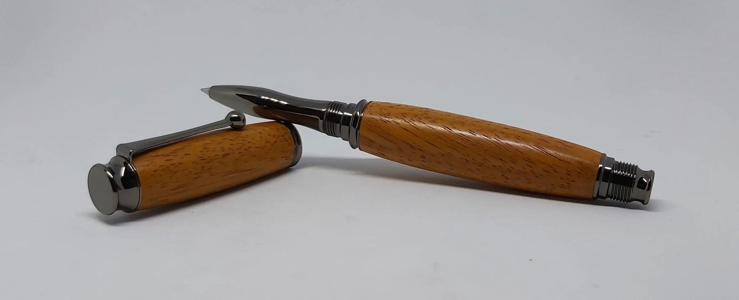 Rollerball pen handmade in Iroko wood from Phoenix Wharf, Plymouth. DevonPens