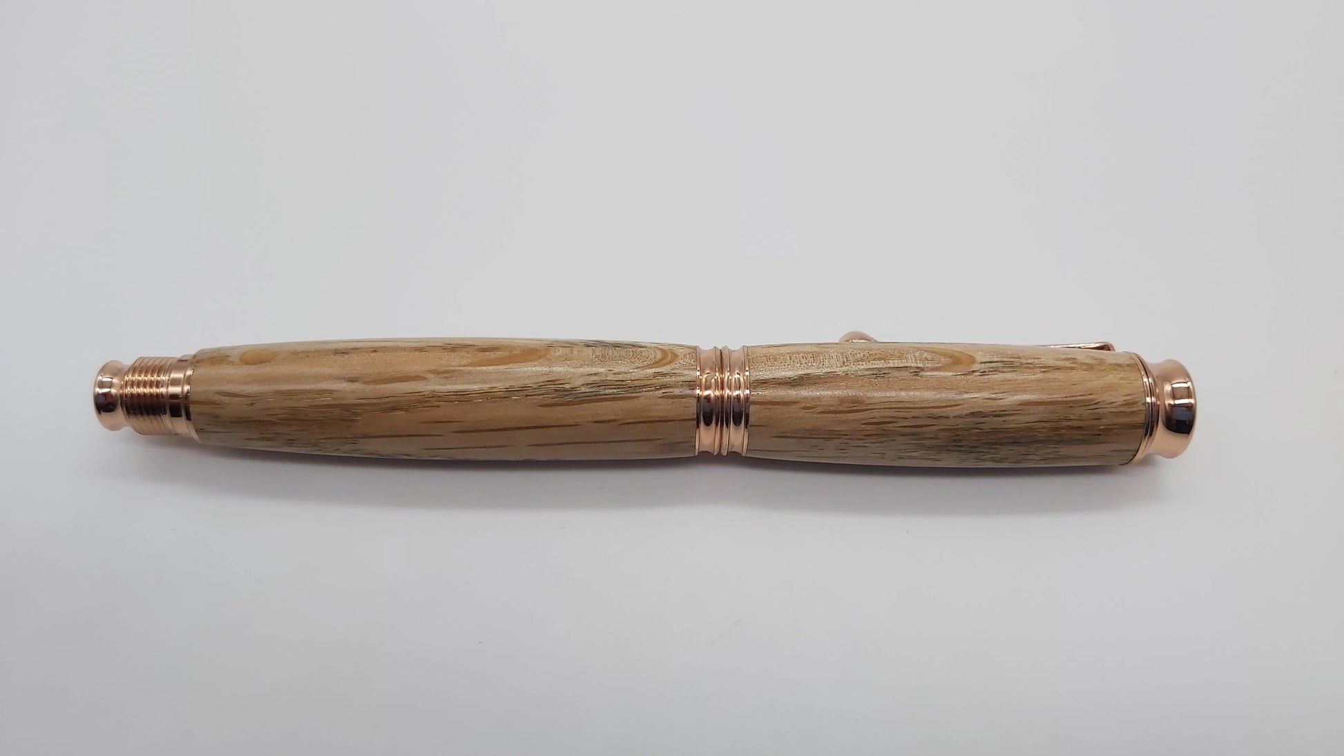 Rollerball pen in Holm Oak from Max gate, former home of Thomas Hardy DevonPens