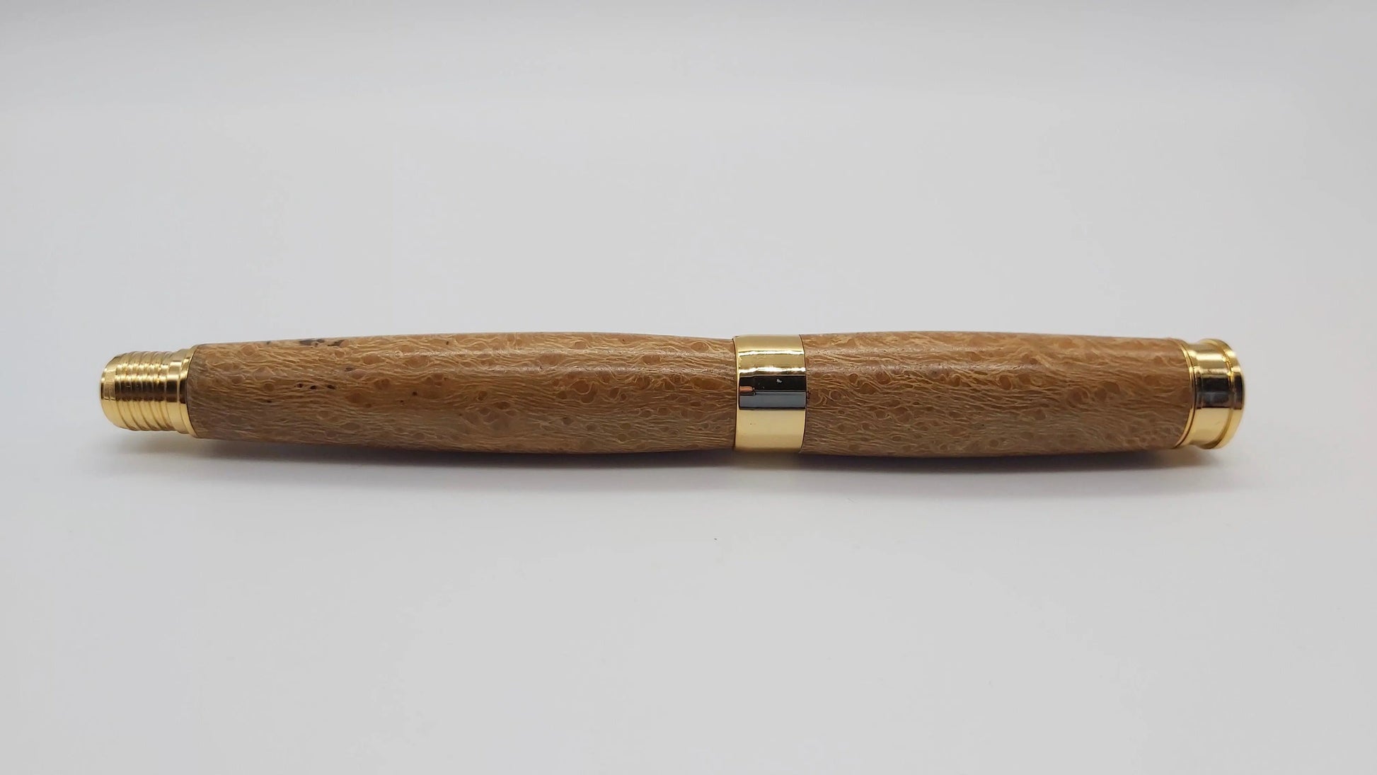 Rollerball pen in Lacewood from Powderham Castle Devon. DevonPens